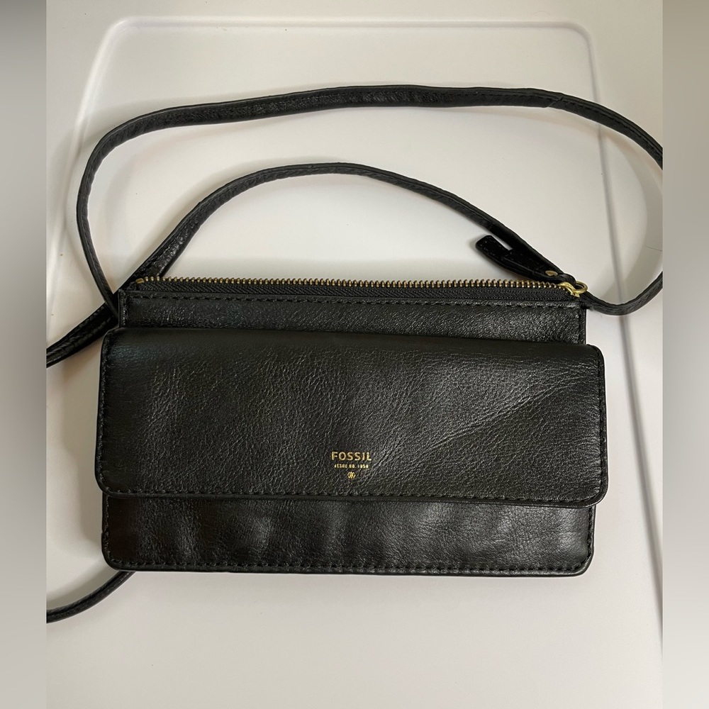 Fossil wallet on a string